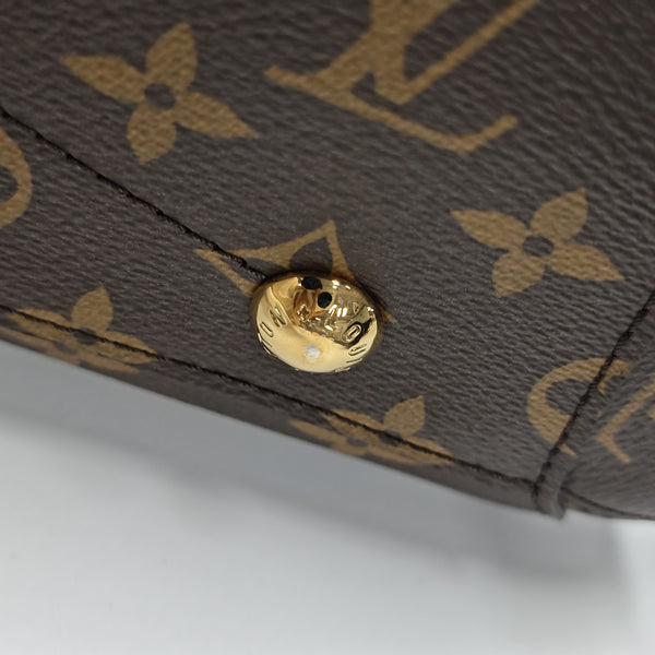 MONTAIGNE GM Monogram Coated Canvas Brown