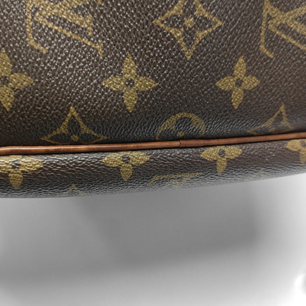 EXCURSION Monogram Coated Canvas Brown