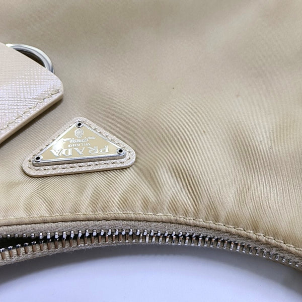 Authenticated pre-owned Re-Edition2005 Nylon Beige - Crossbody Bag at Looply