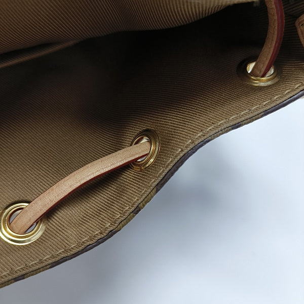 EXCURSION PM Monogram Coated Canvas Brown