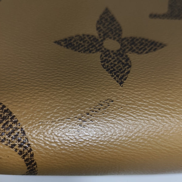 ONTHEGO MM Monogram Coated Canvas Brown