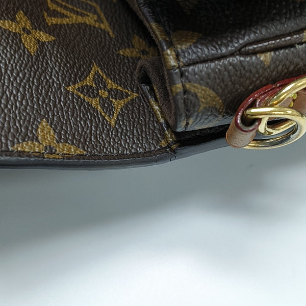 MÉTIS EAST WEST Monogram Coated Canvas Brown
