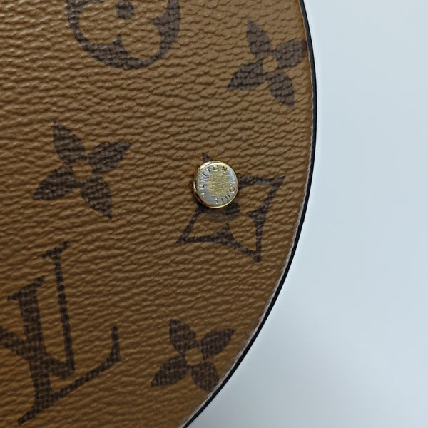 CANNES PM Monogram Coated Canvas Brown