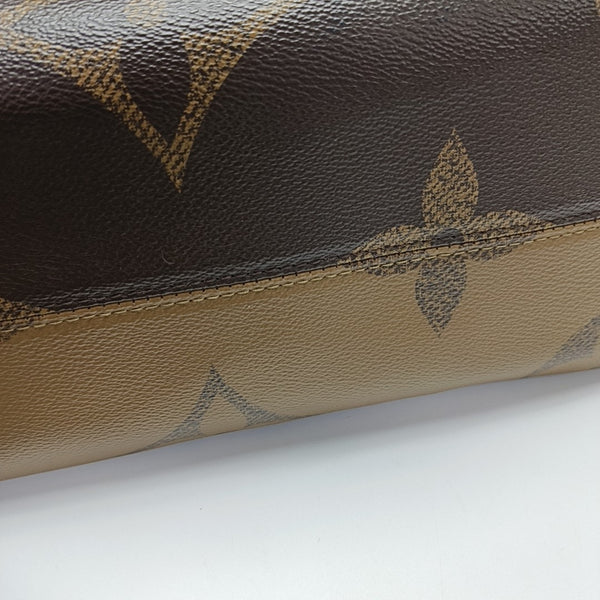 ONTHEGO MM Monogram Coated Canvas Brown