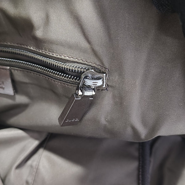 Monogram Coated Canvas Backpack Brown