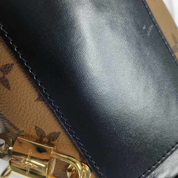 CANNES PM Monogram Coated Canvas Brown