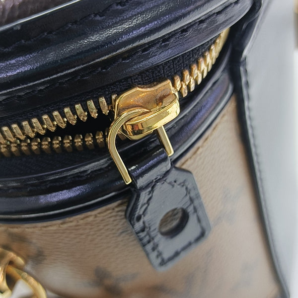 CANNES PM Monogram Coated Canvas Brown
