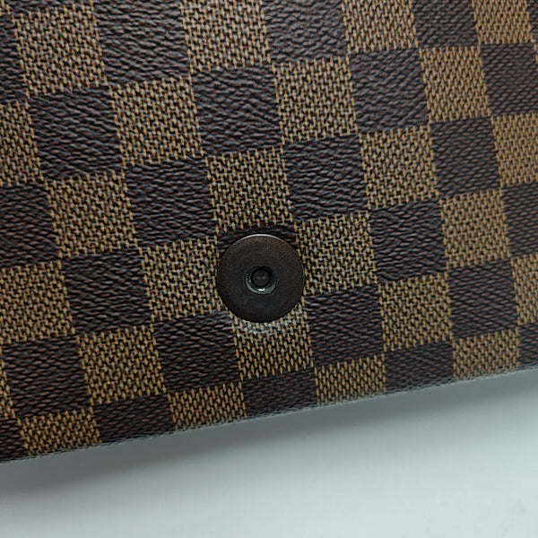TRIBECA Damier Ebene Coated Canvas Brown