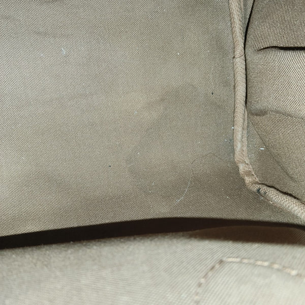 MONTORGUEI PM Monogram Coated Canvas Brown