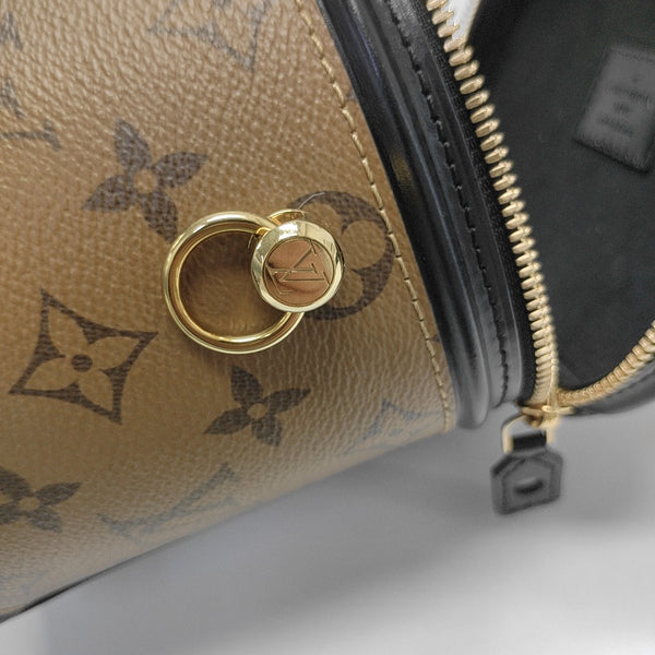 CANNES PM Monogram Coated Canvas Brown