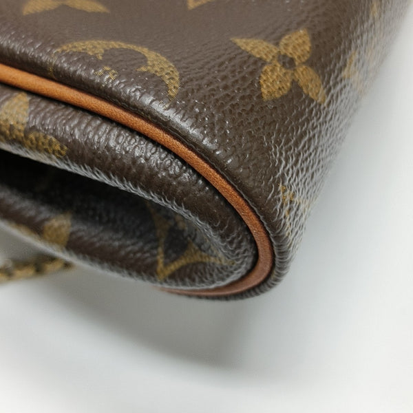 EVA Monogram Coated Canvas Brown