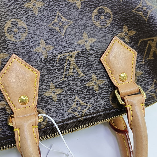 SPEEDY 20 Monogram Coated Canvas Brown