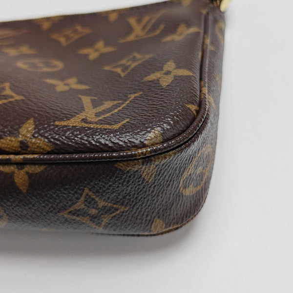 ACCESSOIRES GM Monogram Coated Canvas Brown