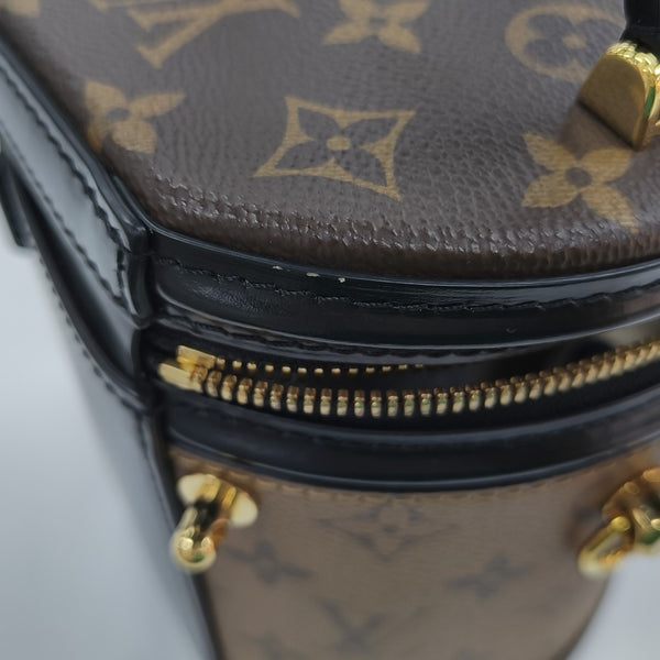 CANNES PM Monogram Coated Canvas Brown