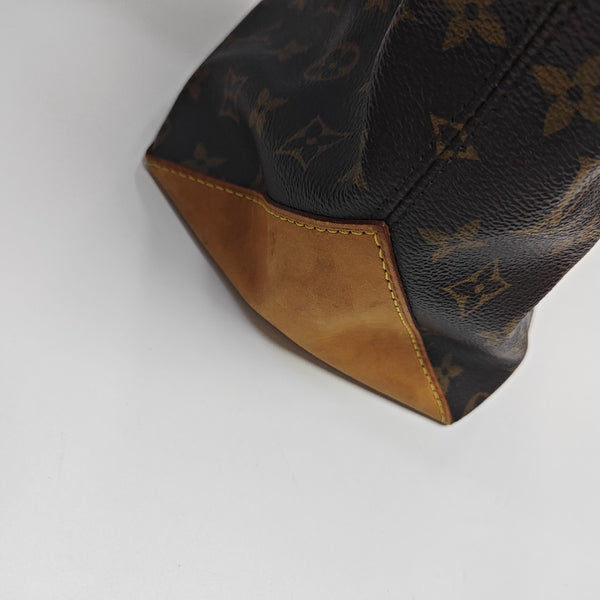 PIANO Monogram Coated Canvas Brown
