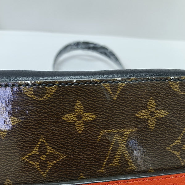 EXPLORER Monogram Coated Canvas Brown