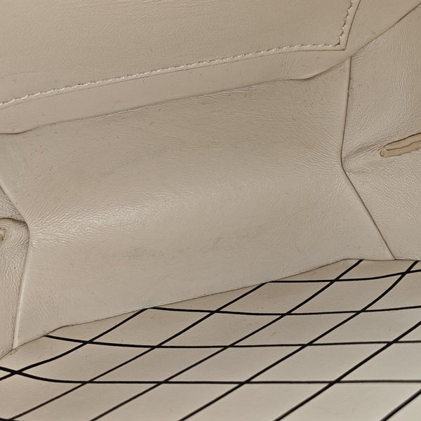 BOITE CHAPEAU PM Monogram Coated Canvas Brown