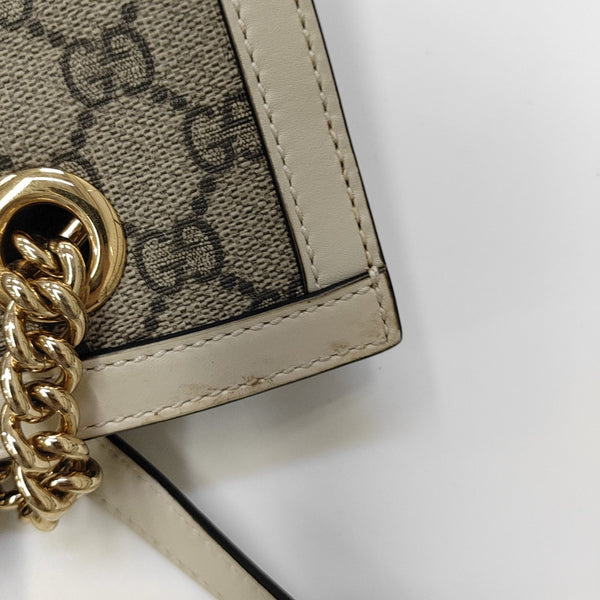 Padlock Small Monogram Coated Canvas Beige
