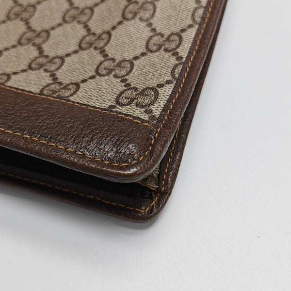 Monogram Coated Canvas Clutch Beige