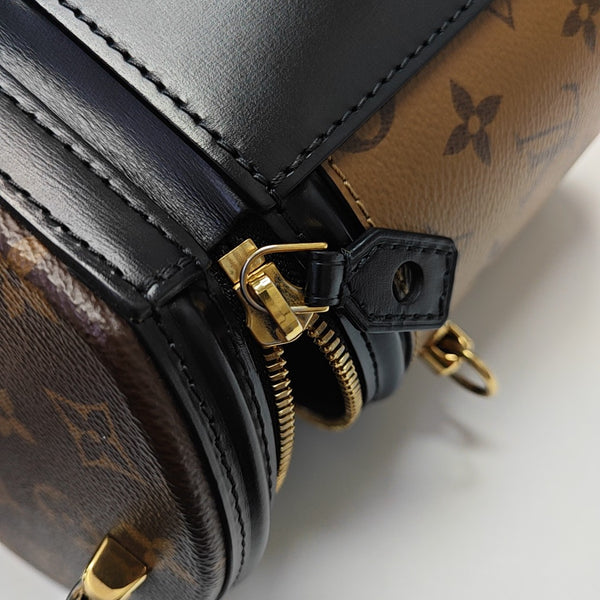 CANNES PM Monogram Coated Canvas Brown
