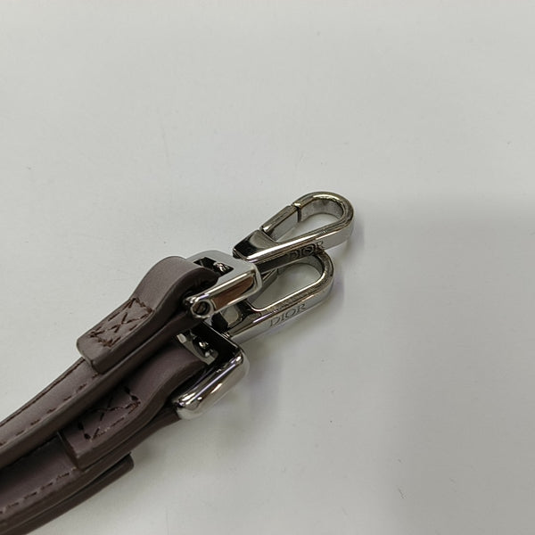 Authenticated pre-owned Saddle Monogram Patent Leather Grey - Shoulder Bag at Looply