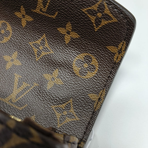 MÉTIS EAST WEST Monogram Coated Canvas Brown