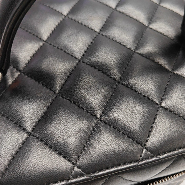 NECESER Piel de cordero acolchada Negro
