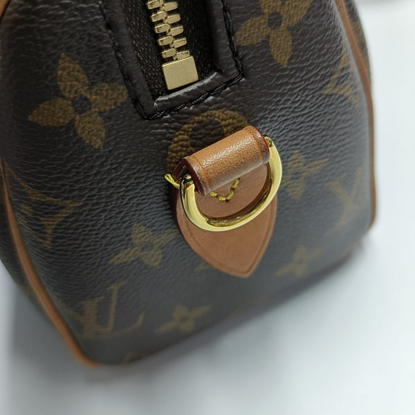 SPEEDY 20 Monogram Coated Canvas Brown