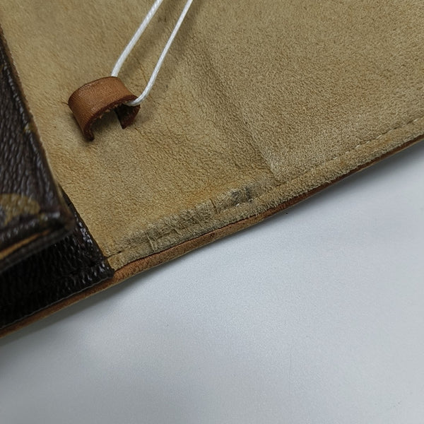 TWIN GM Monogram Coated Canvas Brown