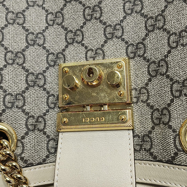 Padlock Small Monogram Coated Canvas Beige