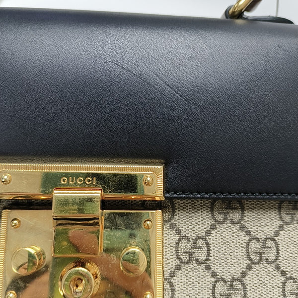 Padlock Small Monogram Coated Canvas Beige