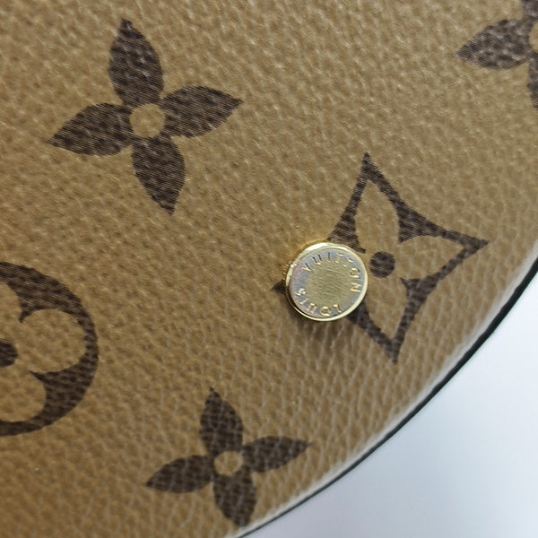 CANNES PM Monogram Coated Canvas Brown