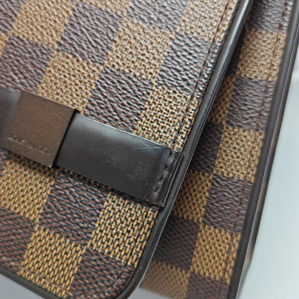 TRIBECA Damier Ebene Coated Canvas Brown
