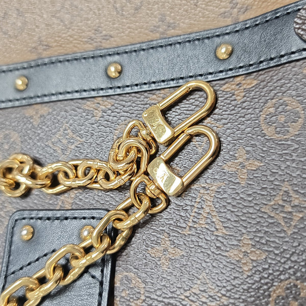 TRUNK Monogram Coated Canvas Brown