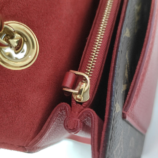 VICTOIRE Monogram Coated Canvas Brown