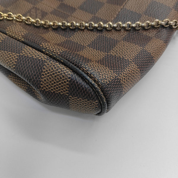 FAVORITE PM Damier Ebene Coated Canvas Brown