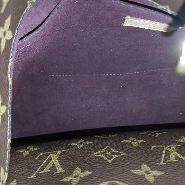 MONTAIGNE GM Monogram Coated Canvas Brown