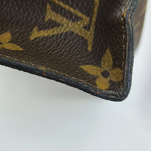 TOILET POCKET Monogram Coated Canvas Brown