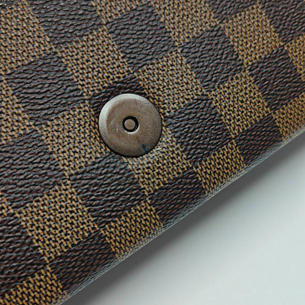 TRIBECA Damier Ebene Coated Canvas Brown