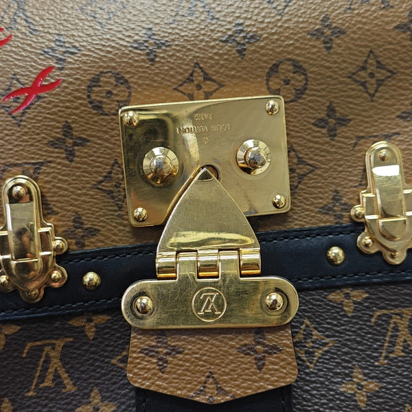 TRUNK Monogram Coated Canvas Brown