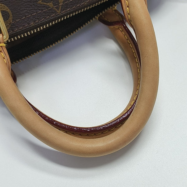 SPEEDY 25 Monogram Coated Canvas Brown