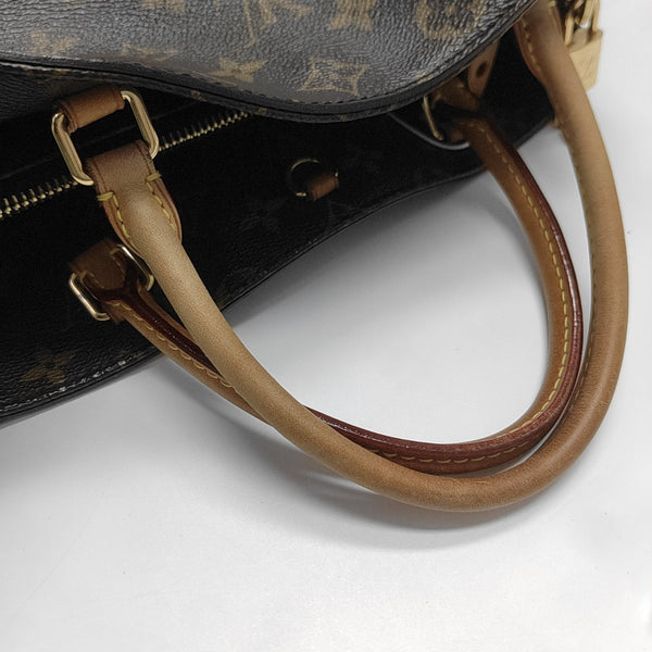MONTAIGNE GM Monogram Coated Canvas Brown