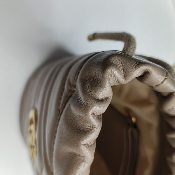 Authenticated pre-owned GG Marmont Mini Quilted Calfskin Beige - Bucket Bag at Looply