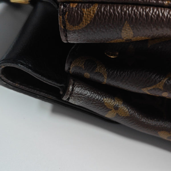 VÉNUS Monogram Coated Canvas Brown