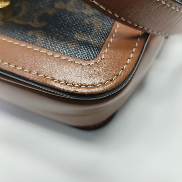 TRIOMPHE Small Coated Canvas Brown