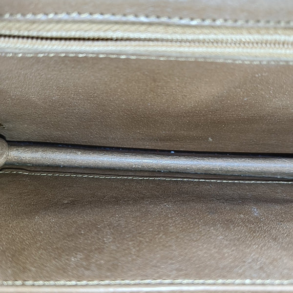 DAME Monogram Coated Canvas Brown