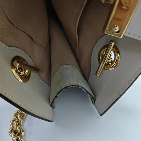 Padlock Small Monogram Coated Canvas Beige