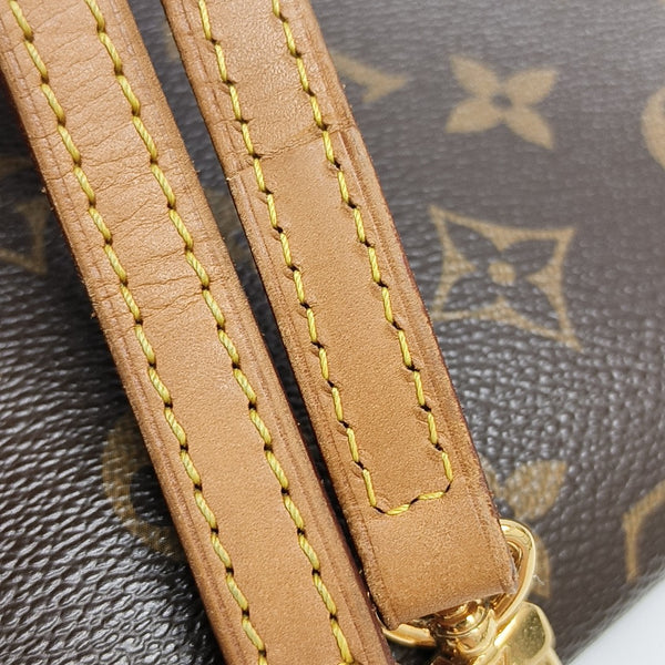 EVA Monogram Coated Canvas Brown
