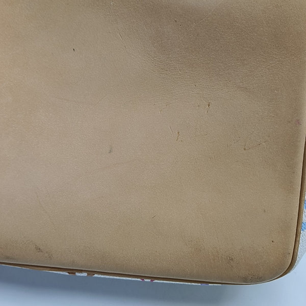 NÉONOÉ MM Monogram Coated Canvas White