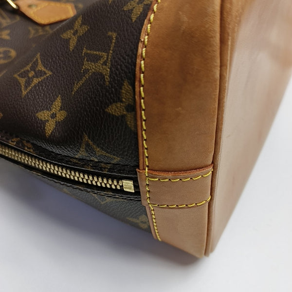 ALMA PM Monogram Coated Canvas Brown